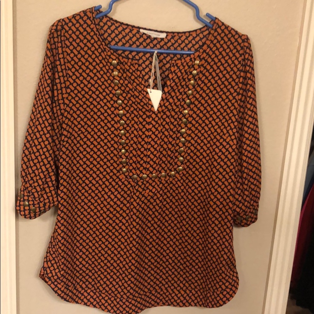 Orange and navy blouse with gold studs
